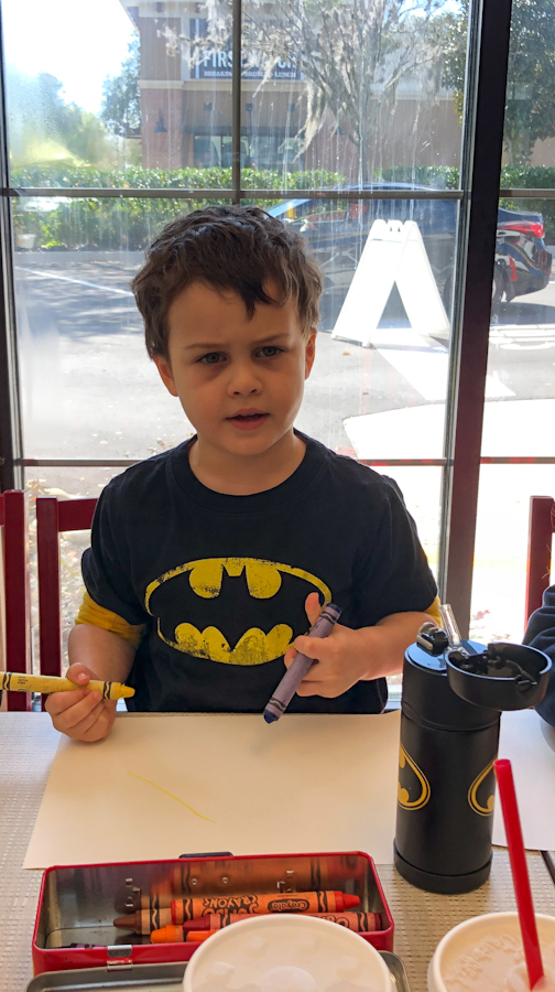 Roman with Batman Shirt and Batman Thermos Water Bottle