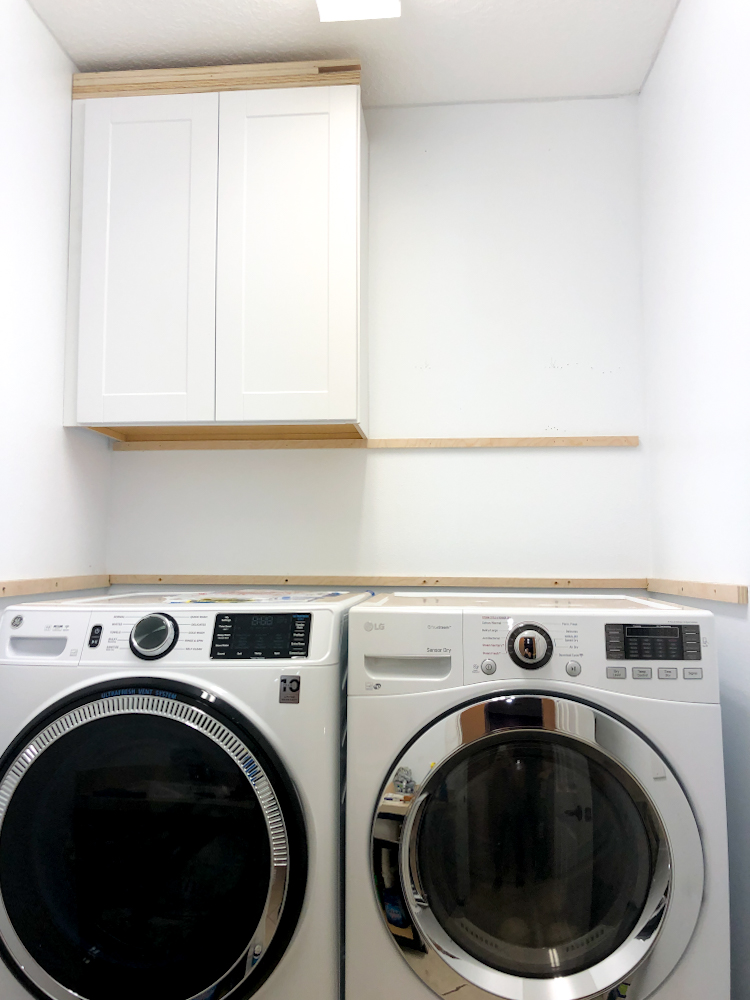 Check out these tips on how we installed these laundry room cabinets and other helpful information to DIY your laundry room