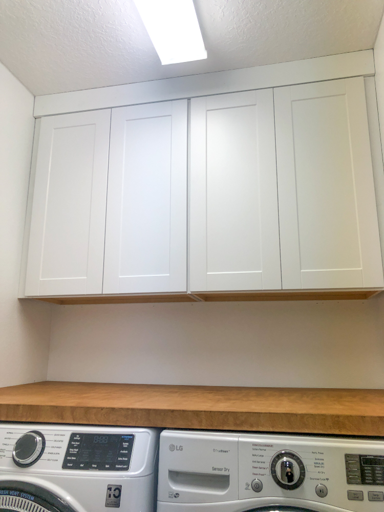 check out the finished product of our laundry room cabinets and all the other DIY projects we did