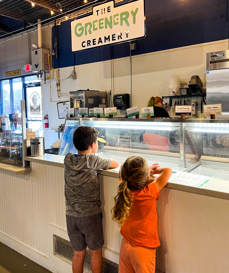 2 kids waiting for ice cream at one of the restaurants in Sanford Florida, The Greenery Creamery