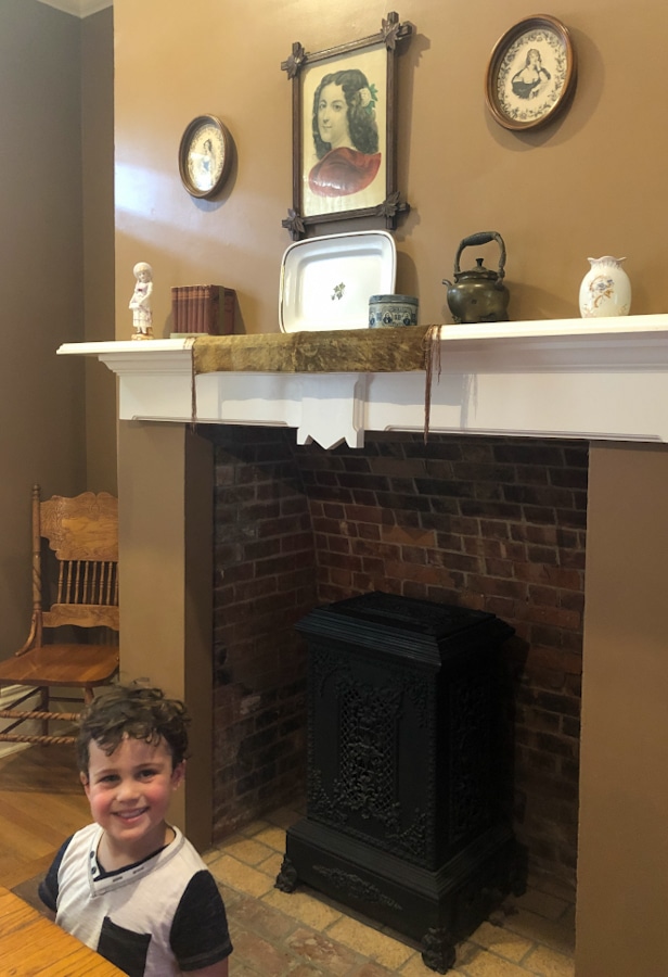 small child in the lighthouse keepers parlor replica at the St Augustine Lighthouse Museum in St Augustine Florida