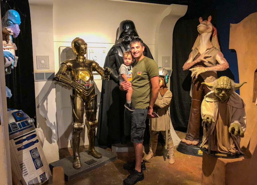 parent and child standing in front of the Star Wars exhibit at the Potter's Wax Museum in St Augustine Florida