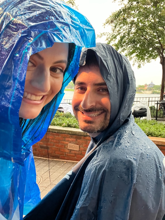 wearing ponchos in the rain at Disney's Epcot
